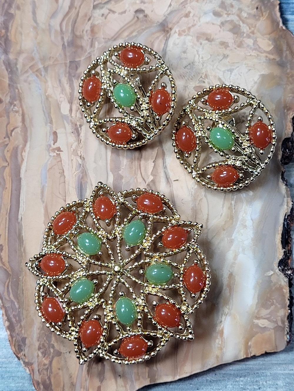 Sarah Coventry Floral Brooch and Clip Earrings with Green and Orange Cabochons